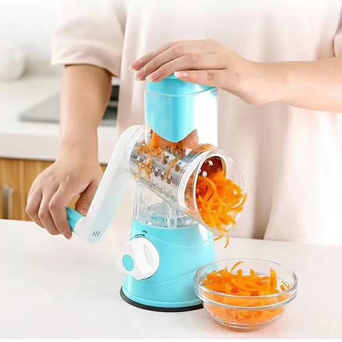 Shoppikala multifunctional vegetable slicer and shredder with three sharp drums for grating cheese, vegetables, and more.