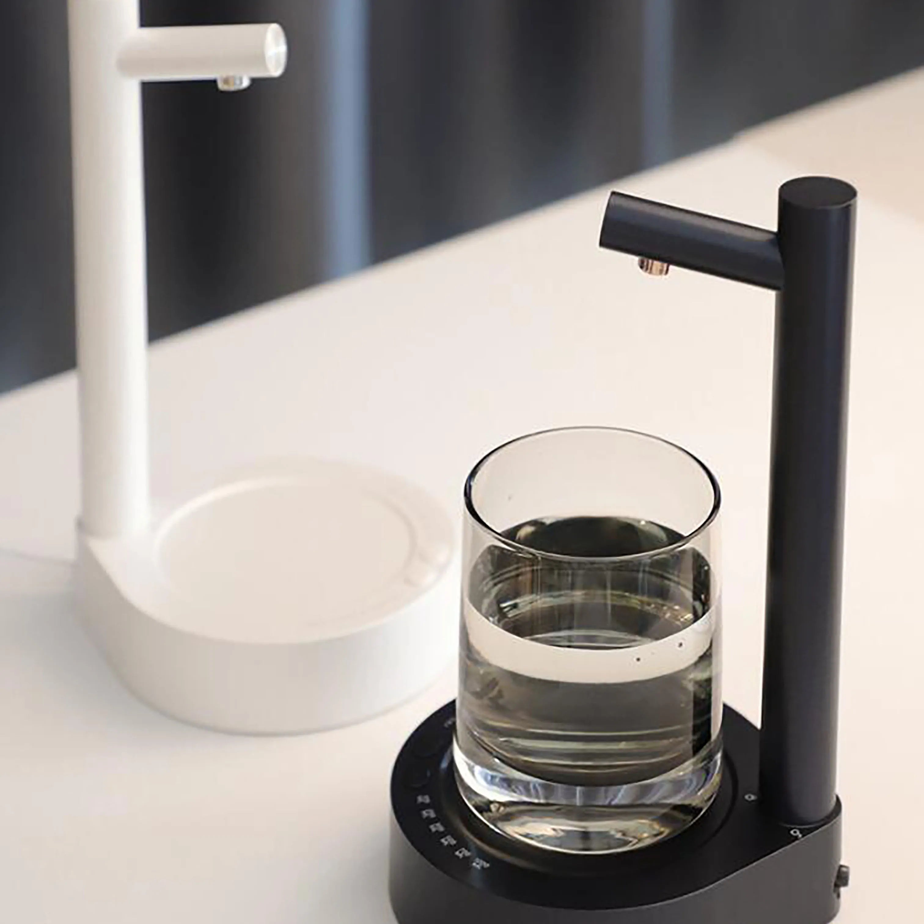 USB rechargeable smart desktop water pump by Shoppikala, electric bucket water dispenser with automatic operation and compact design.