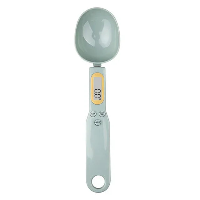 Digital measuring spoon from Shoppikala with LCD display, 500g capacity, ideal for precise milk, coffee, and sugar measurements.