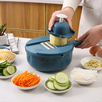 Shoppikala 12-in-1 vegetable chopper and slicer for cutting, shredding, and grating carrots in commercial kitchens.